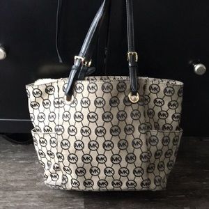 Beige and Black Michael Kors purse